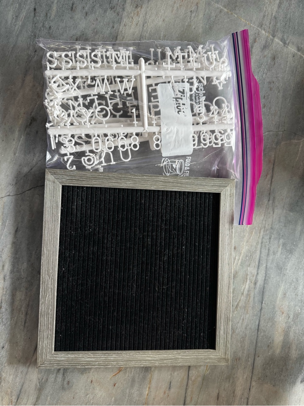 Black Felt Letter Board with Gray Wood-Style Frame and White Plastic Letters